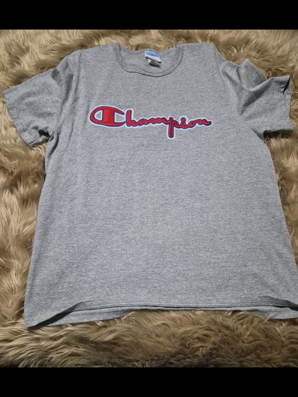 Champion Tee